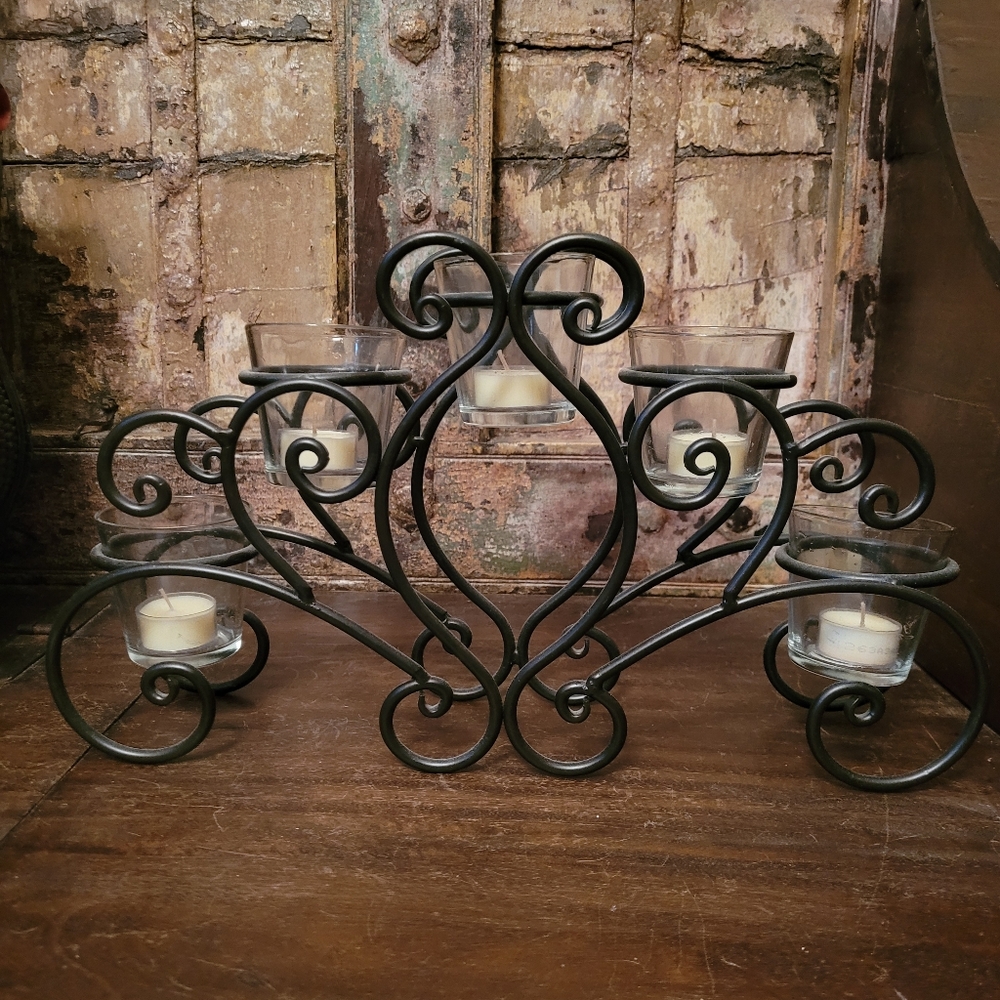 Metal candlebra with 5 glass candle holders